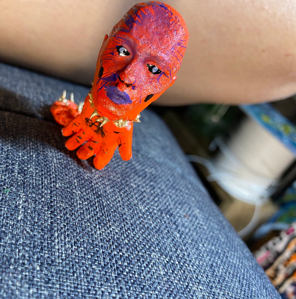 Just a man with a plan who needs no helping hand. Has a tail so he doesn't fail yet it chains him from within his home made jail. He's prayed for change yet remains the same. - small art toy figure by AEQEA